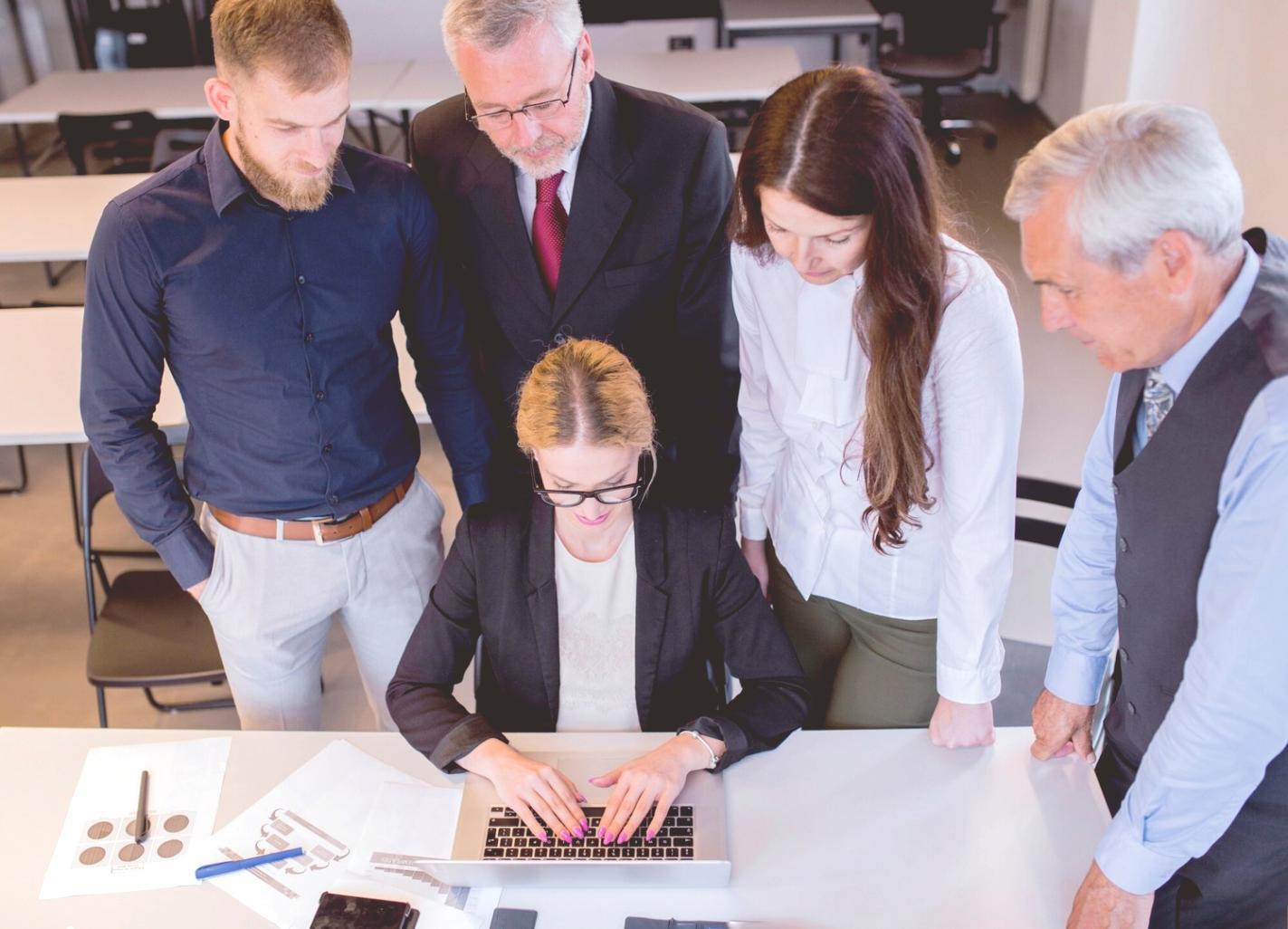 Students engaged in practical financial scenario exercises